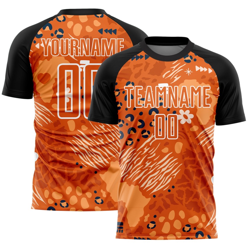 Benutzerdefiniertes Orange Bay Orange-Schwarzes Fußballtrikot mit afrikanischem Muster Benutzerdefiniertes Orange Bay Orange-Schwarzes Fußballtrikot mit afrikanischem Muster